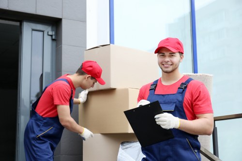 Movers handling access challenges in a Norwegian apartment building