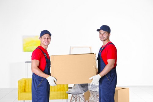 Furniture and boxes being loaded into a removals van for a Norway move