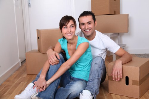 Packed boxes and wrapped furniture ready for transport during a home relocation