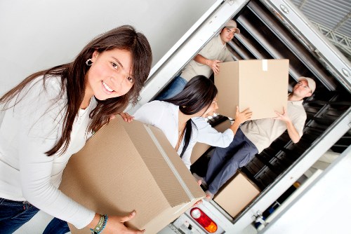 Moving truck loaded with furniture and boxes for a home relocation in Norway